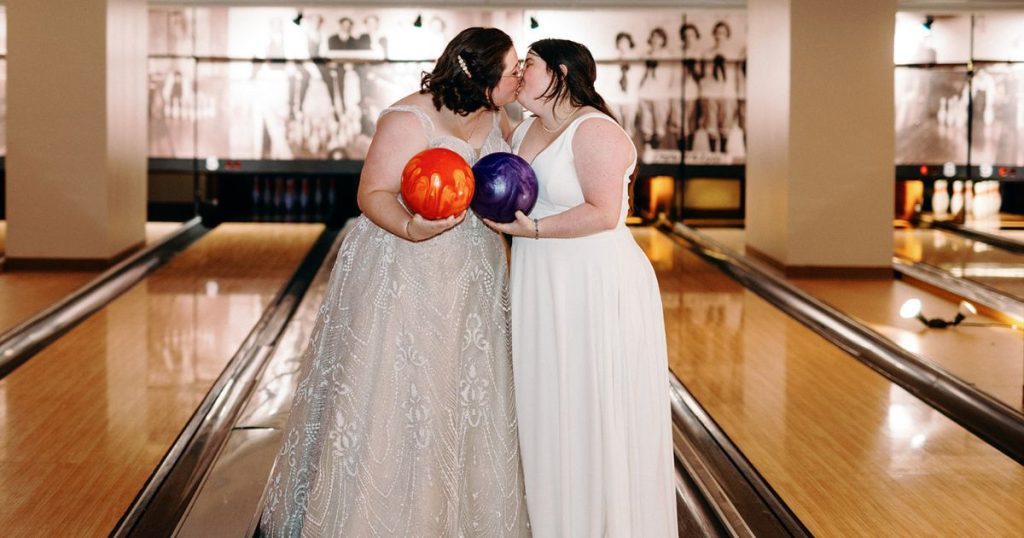 Brides posing on the bowling lanes at Pinstripes DC wedding venue