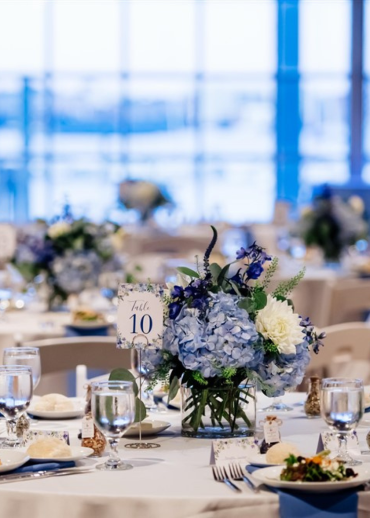 wedding centerpieces with blue and white flowers