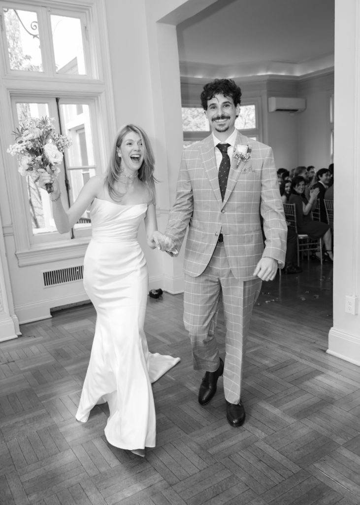 a couple on their wedding day showing excitement