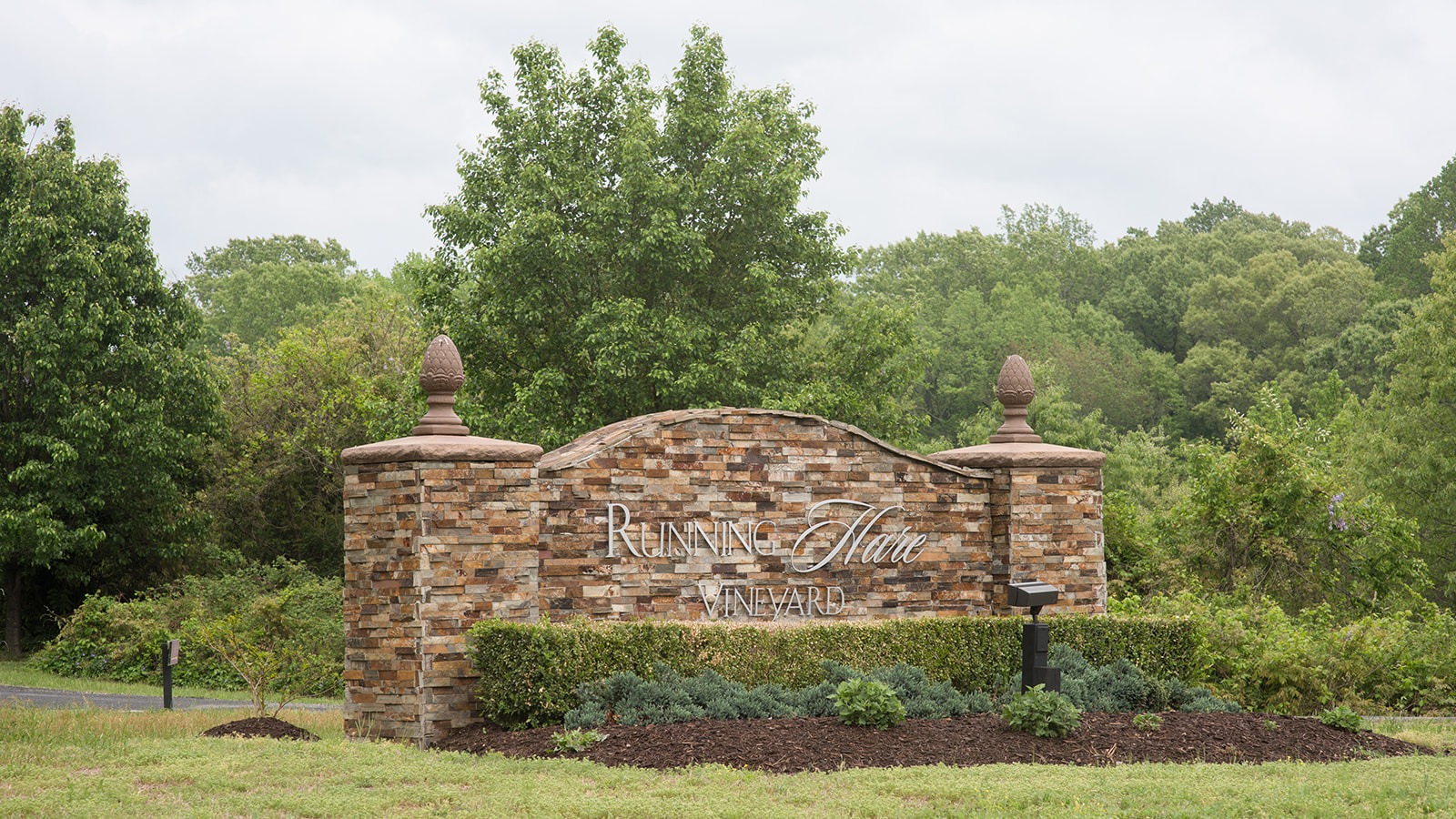 brick entrance gate to Running Hare Vineyard