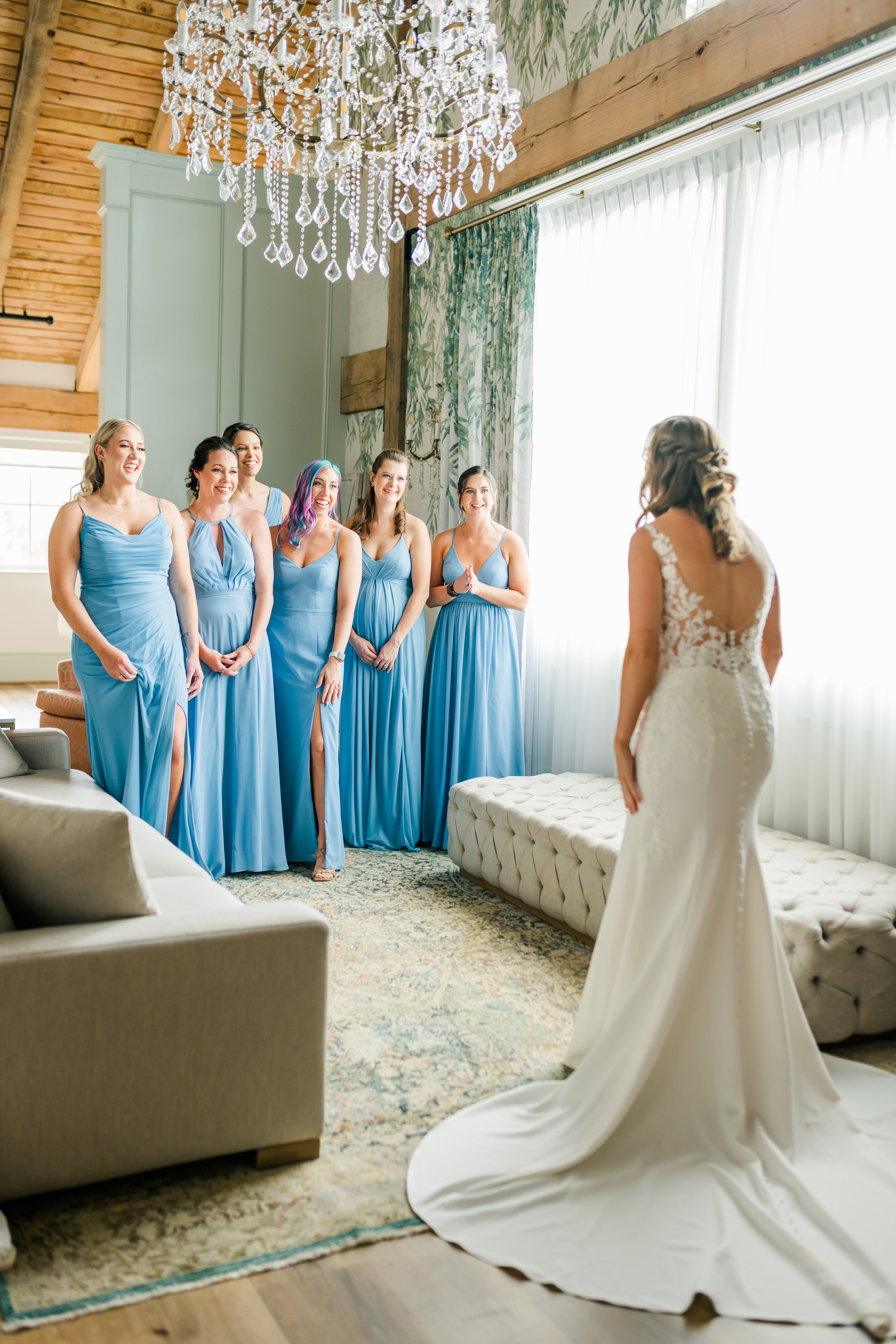 bride's first look with bridesmaids
