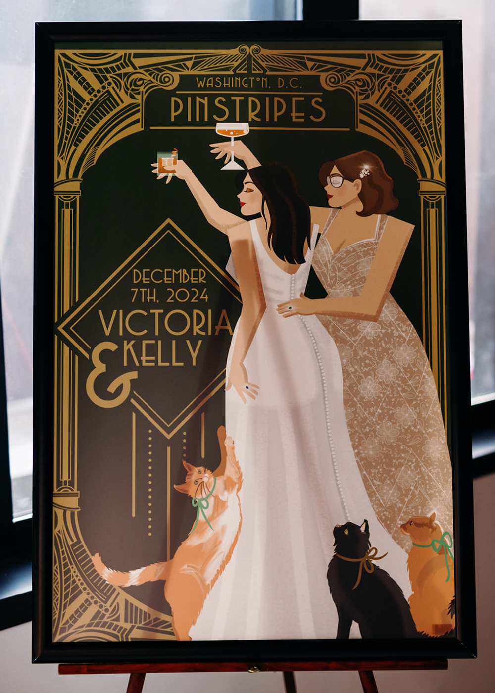 a wedding sign with a sketch of the couple Victoria and Kelly and their cats at Pinstripes Georgetown in Washington DC